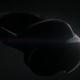 A screenshot of a video showing the darkened outline of a VR headset.